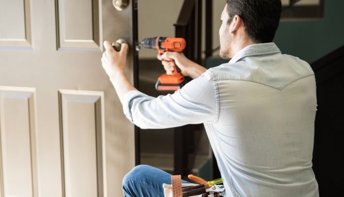 Locksmith Servicing a lock Locksmith Servicing a lock