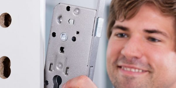 Locksmith Installing a New Lock Locksmith Installing a New Lock