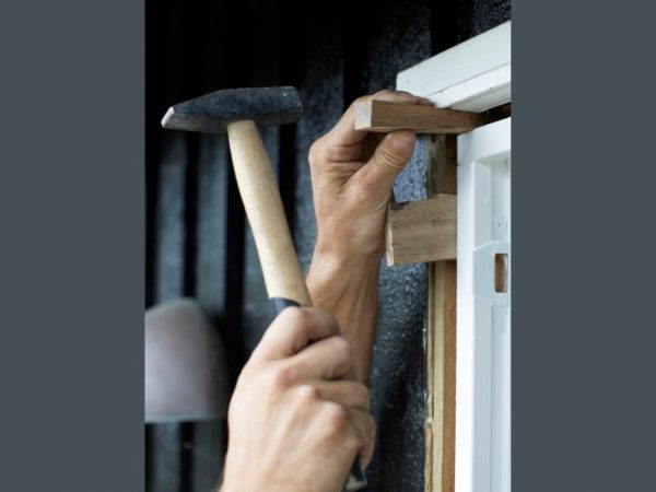 Untitled design Wedging the door